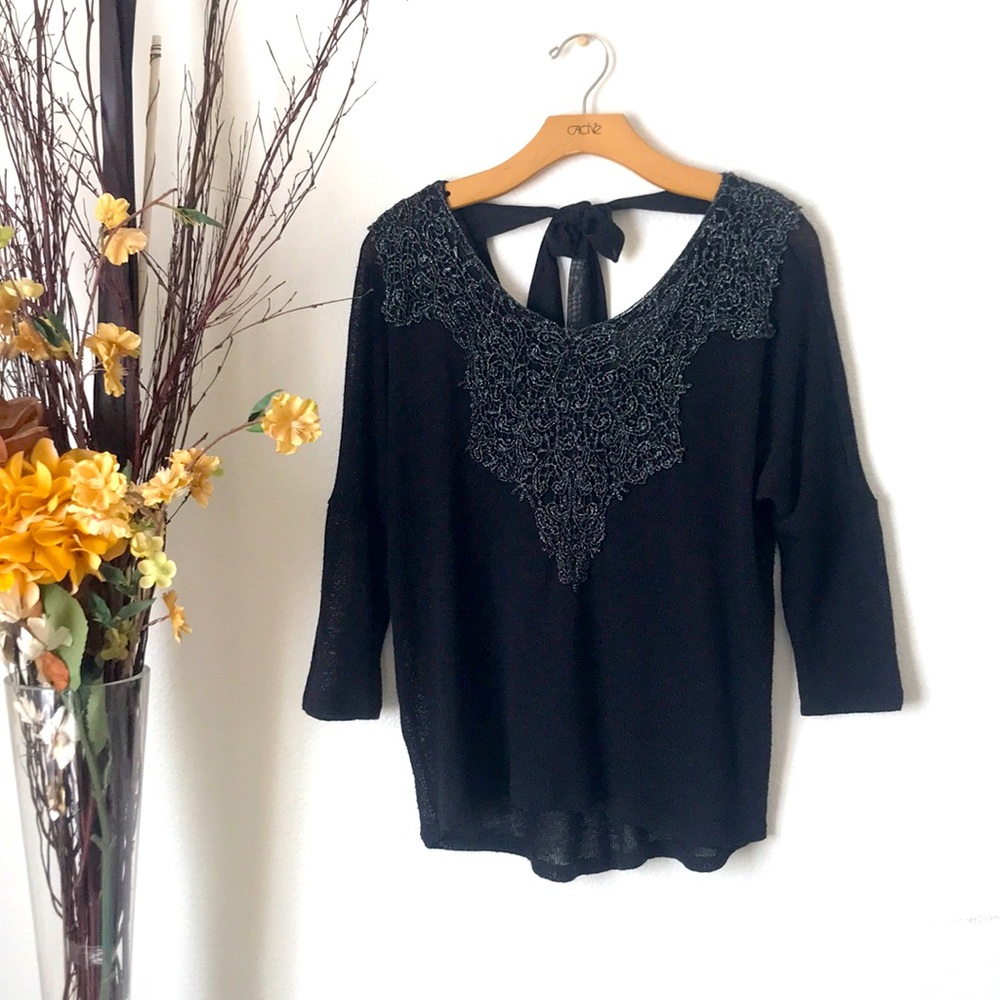 Black blouse.